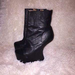 JC black anti gravity inverted leather booties